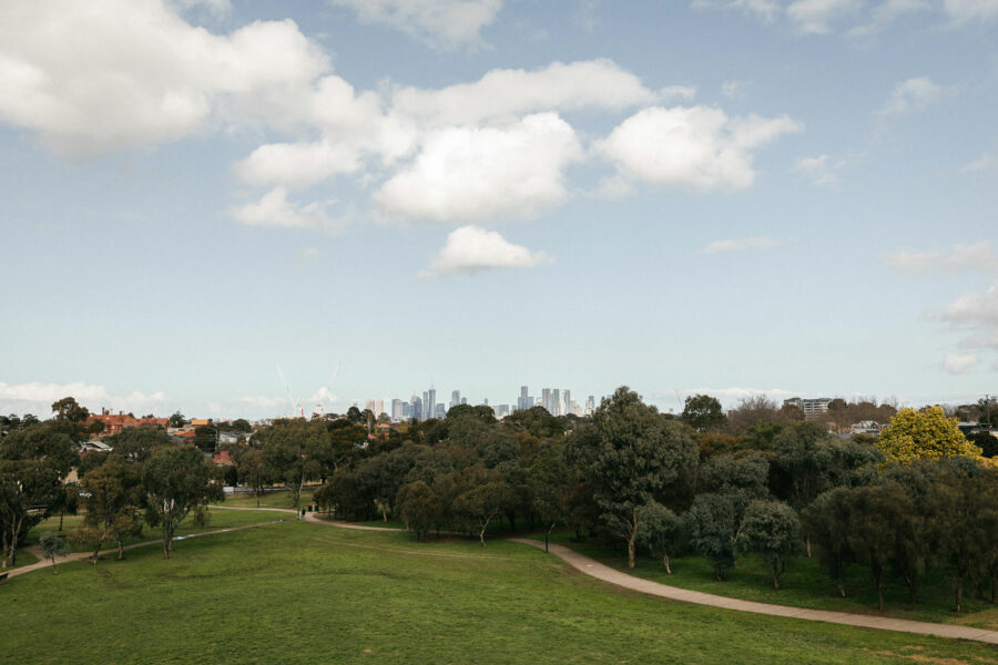Parkland with Melbourne CBD nestled in the distance