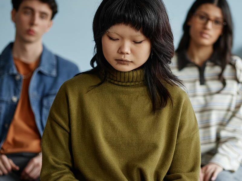 A group of multicultural teenagers attending a workshop.